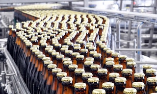 Slaur Sardet: un depósito automático con 8 transelevadores para gestionar 160 millones de botellas/año